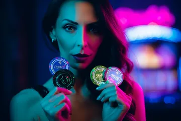 2777BET6 Slots — Thousands of thrilling machines await A woman smiling by bright slot machines showing lucky symbols, showcasing the exciting slot offerings at 2777BET6.